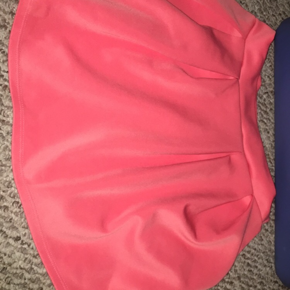 A peach color skirt